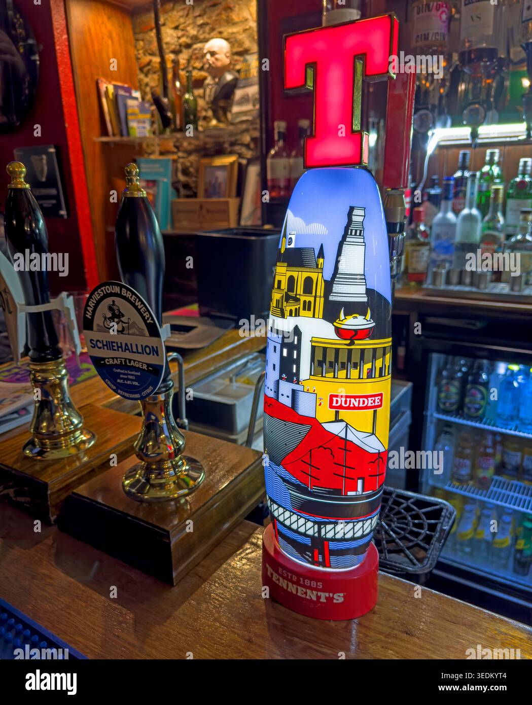 Dundee-themed Tennent’s beer pump font at The Pillars Bar on Crichton Street, one of Dundee’s historic real ale pubs. Stock Photo