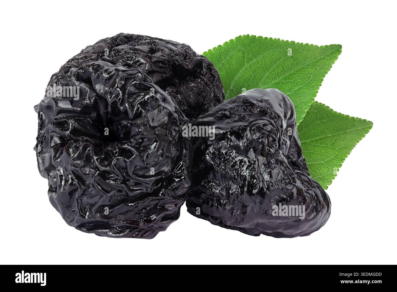Prunes isolated on white background, heap of dried plums. Stock Photo