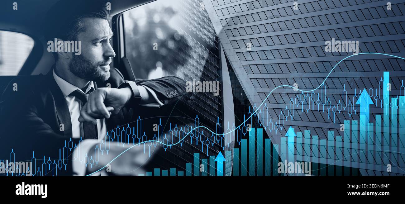Handsome bearded man in suit sitting in car Stock Photo