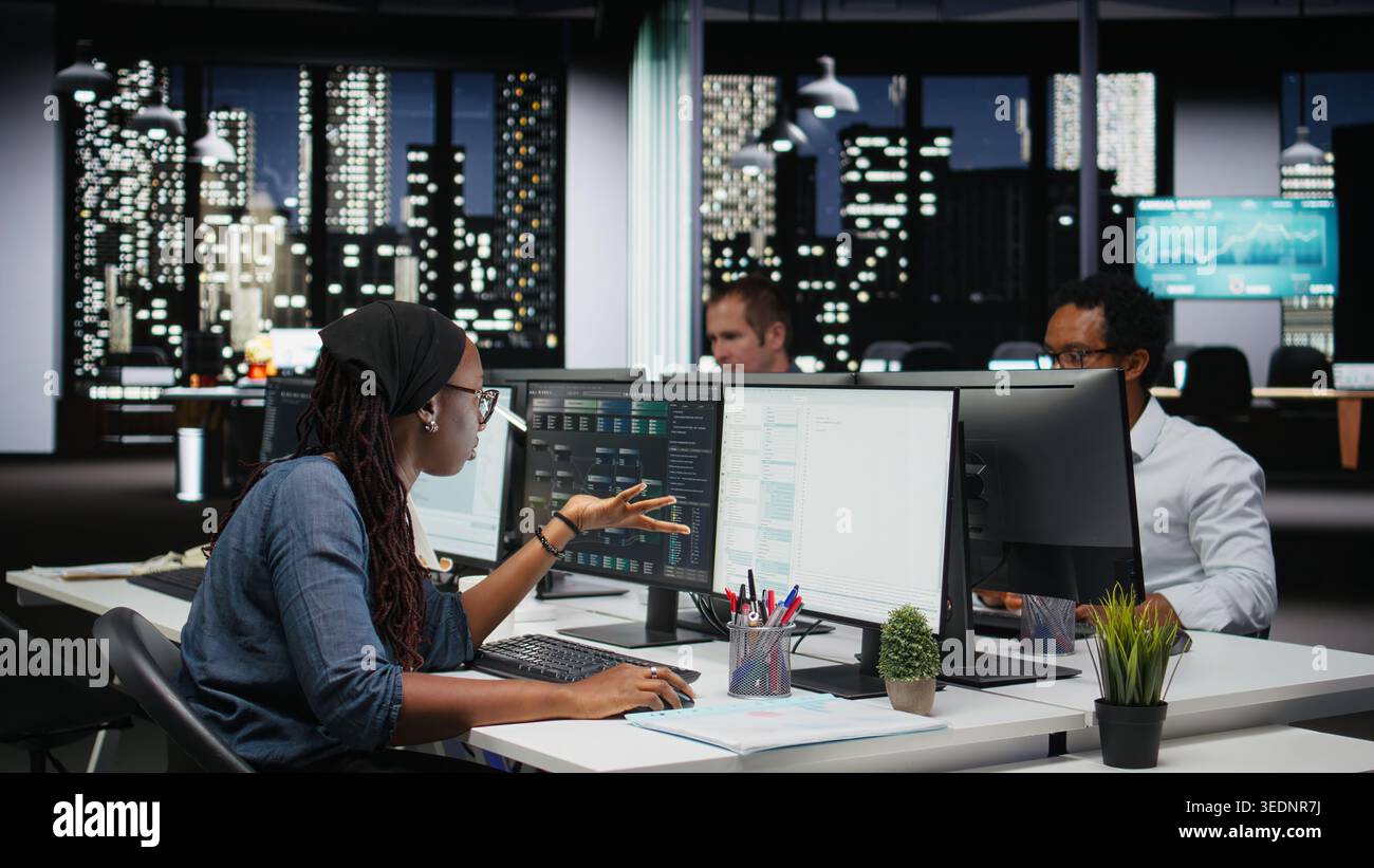 Programmer in Silicon Valley company office struggling with errors while developing apps. Employee frustrated by glitches while debugging applications with machine learning coding Stock Photo