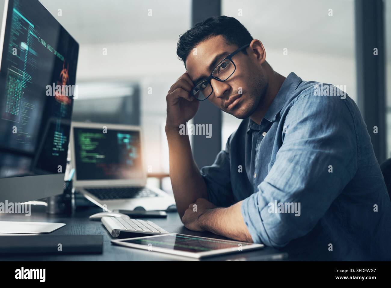 Man, portrait and software engineer with computer in office for coding, programming or algorithm. Male person, coder or developer with glasses or Stock Photo