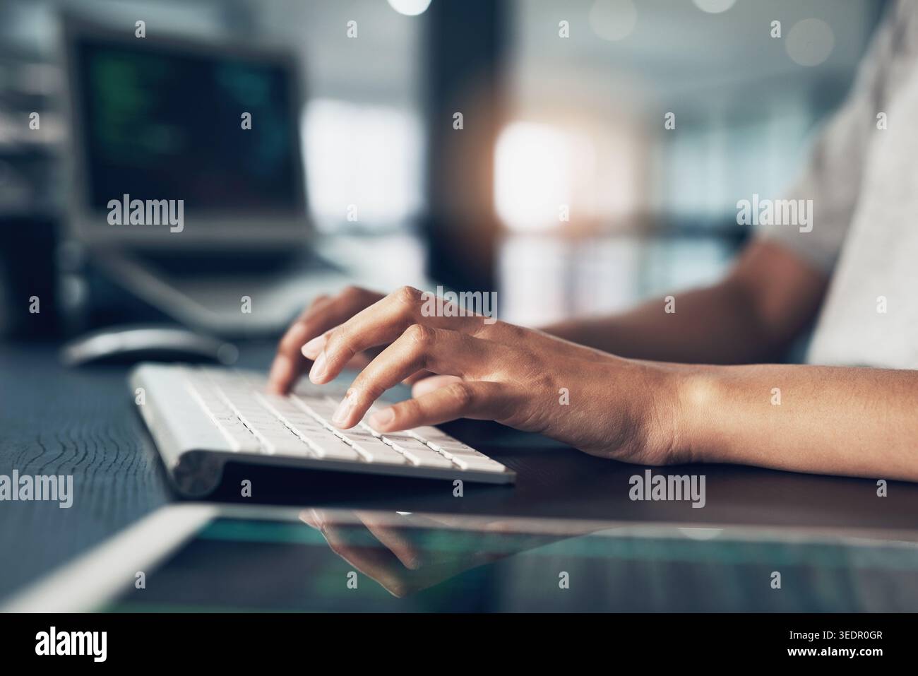 Coding, typing and hands of person on computer for programming, website and software design. Office, programmer and worker with keyboard for web Stock Photo