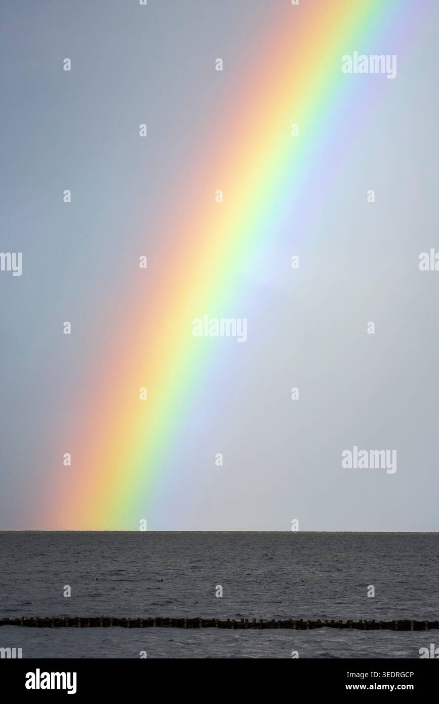Rainbow over the Wadden Sea Stock Photo