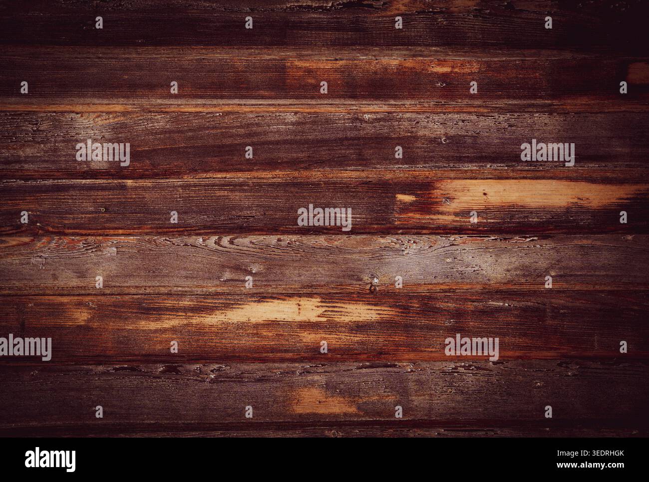 Rustic weathered wooden wall made from old boards. Vintage background texture. Close-up. Stock Photo