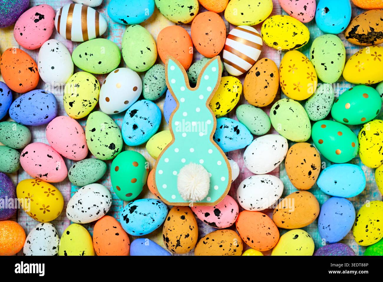 Easter bunny figurine with Easter eggs Stock Photo