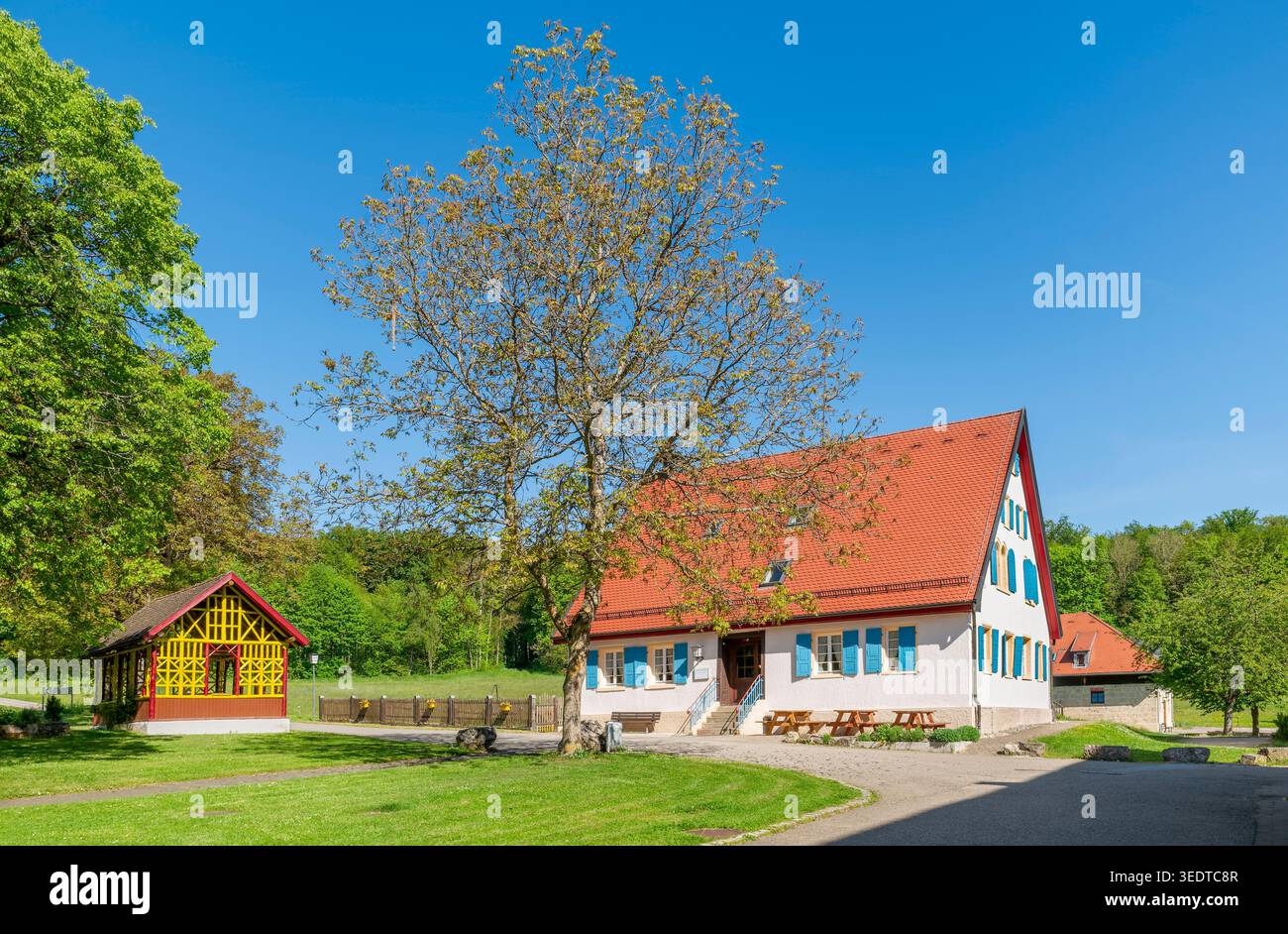 St. Georgenhof was founded in 1863 by Johann Georg Schneider as a resettlement farm. Alfred Schradin, a factory owner from Reutlingen, acquired the farm in 1920 and developed it into a private stud farm. In 1930/31, the Berlin banker Robert von Mendelssohn acquired the farm. Haus am Berg GmbH bought the estate in 1972. Today the estate is used by the BruderhausDiakonie as a leisure home, Pfronstetten, Germany Stock Photo