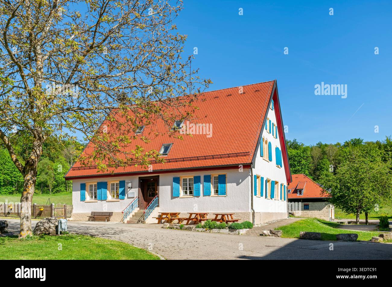 The St. Georgenhof was founded in 1863 by Johann Georg Schneider as a resettlement farm. Alfred Schradin, a factory owner from Reutlingen, acquired the farm in 1920 and developed it into a private stud farm. In 1930/31, the Berlin banker Robert von Mendelssohn acquired the farm. Haus am Berg GmbH bought the estate in 1972. Today the estate is used by the BruderhausDiakonie as a leisure home, Pfronstetten, Germany Stock Photo