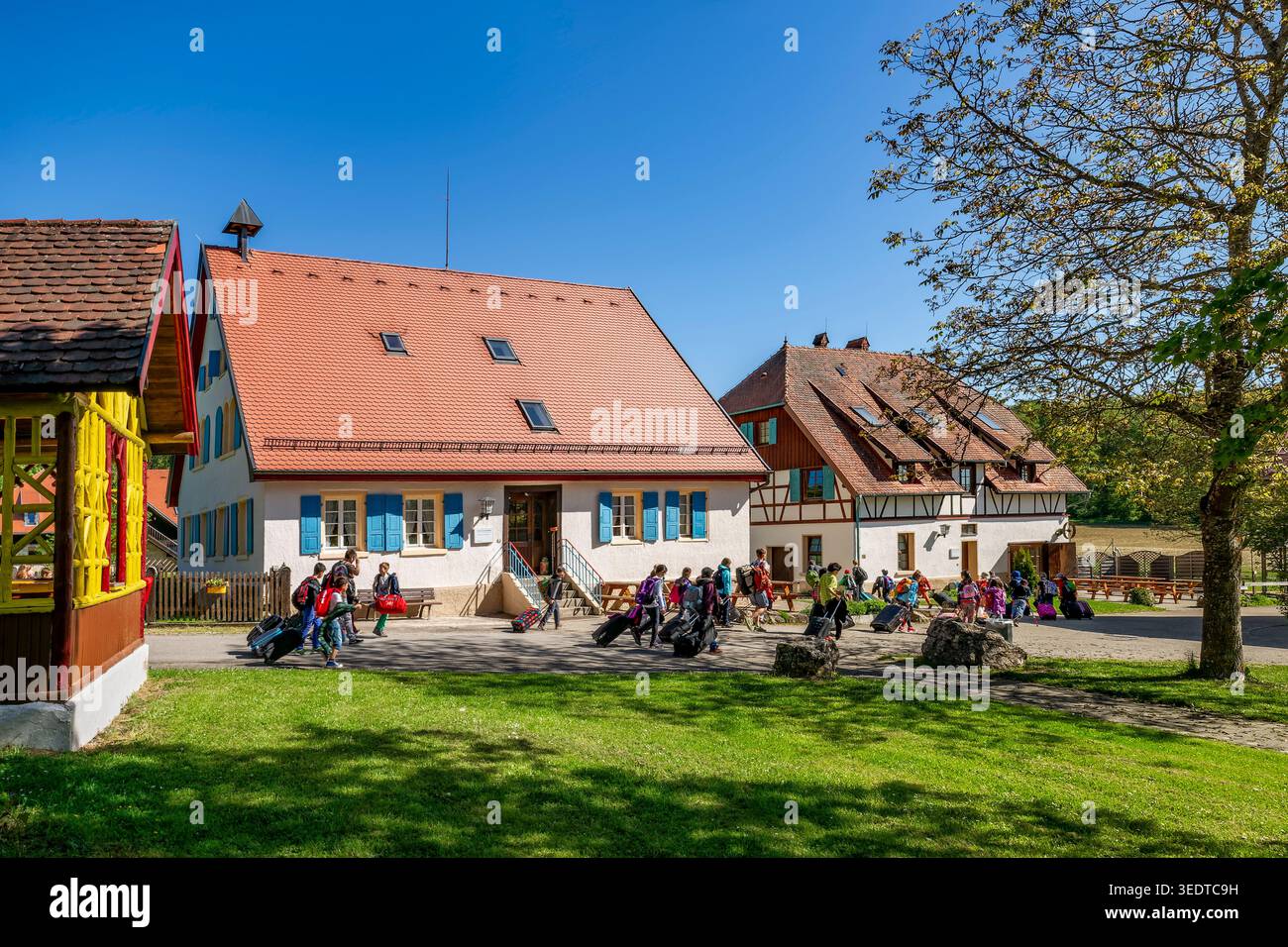 The St. Georgenhof was founded in 1863 by Johann Georg Schneider as a resettlement farm. Alfred Schradin, a factory owner from Reutlingen, acquired the farm in 1920 and developed it into a private stud farm. In 1930/31, the Berlin banker Robert von Mendelssohn acquired the farm. Haus am Berg GmbH bought the estate in 1972. Today the estate is used by the BruderhausDiakonie as a leisure center, Pfronstetten, Germany Stock Photo
