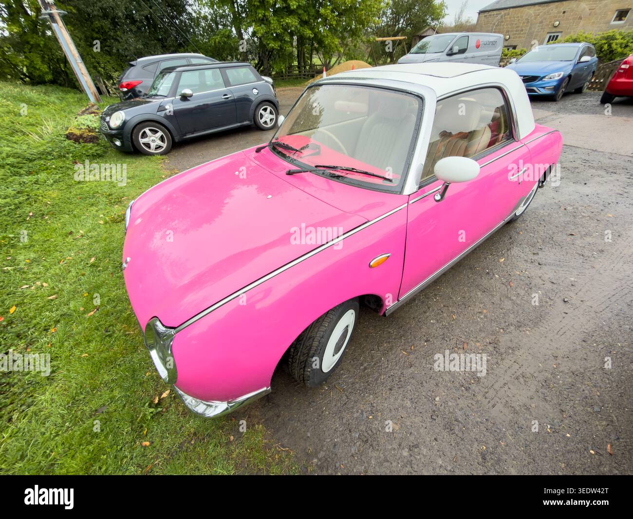 Pink nissan figaro car hi-res stock photography and images - Alamy