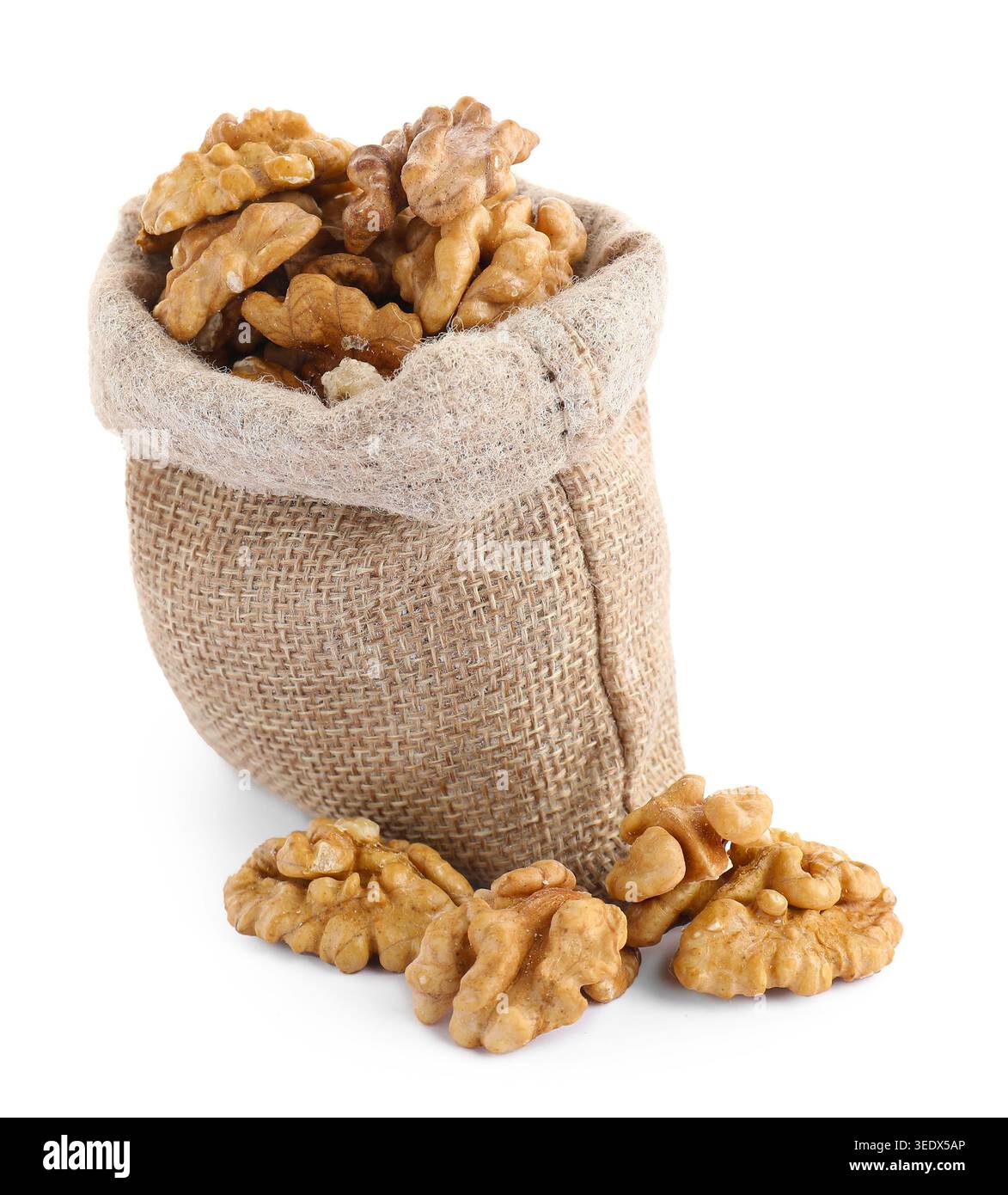 Walnuts in burlap bag isolated on white Stock Photo