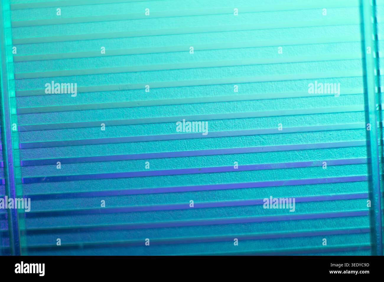 Abstract horizontal striped cyan blue polycarbonate texture background Stock Photo