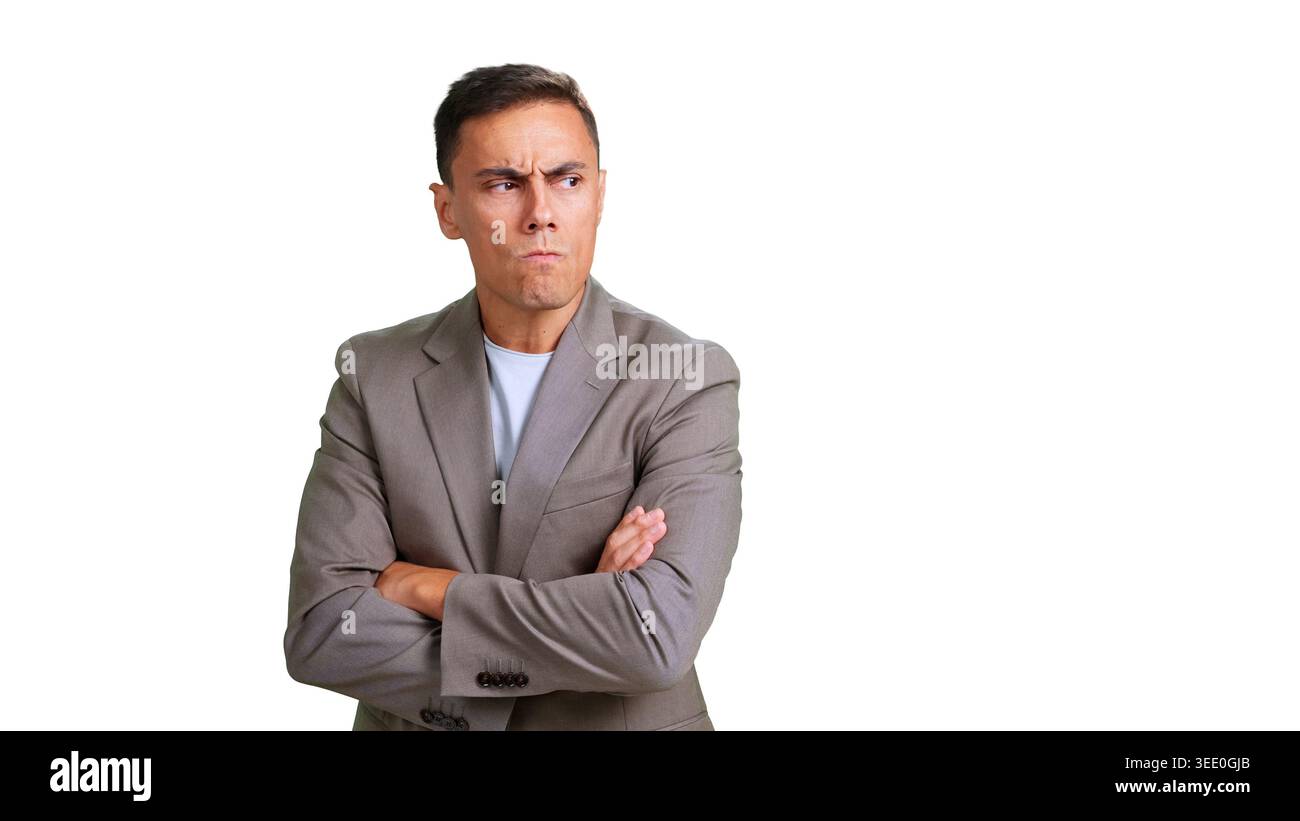 Man feeling skeptical and mistrusting with crossed arms Stock Photo