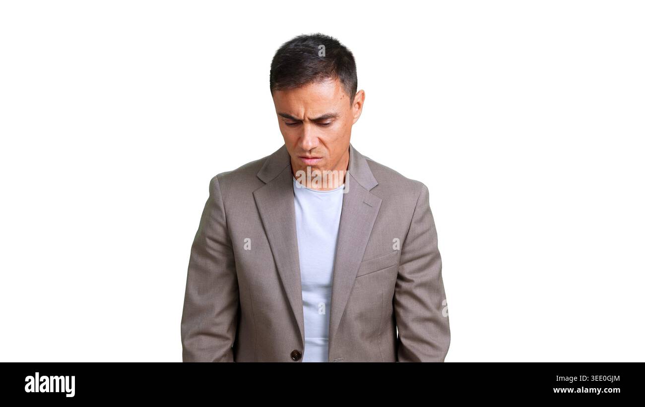 Concerned man looking down feeling disappointment and regret Stock Photo