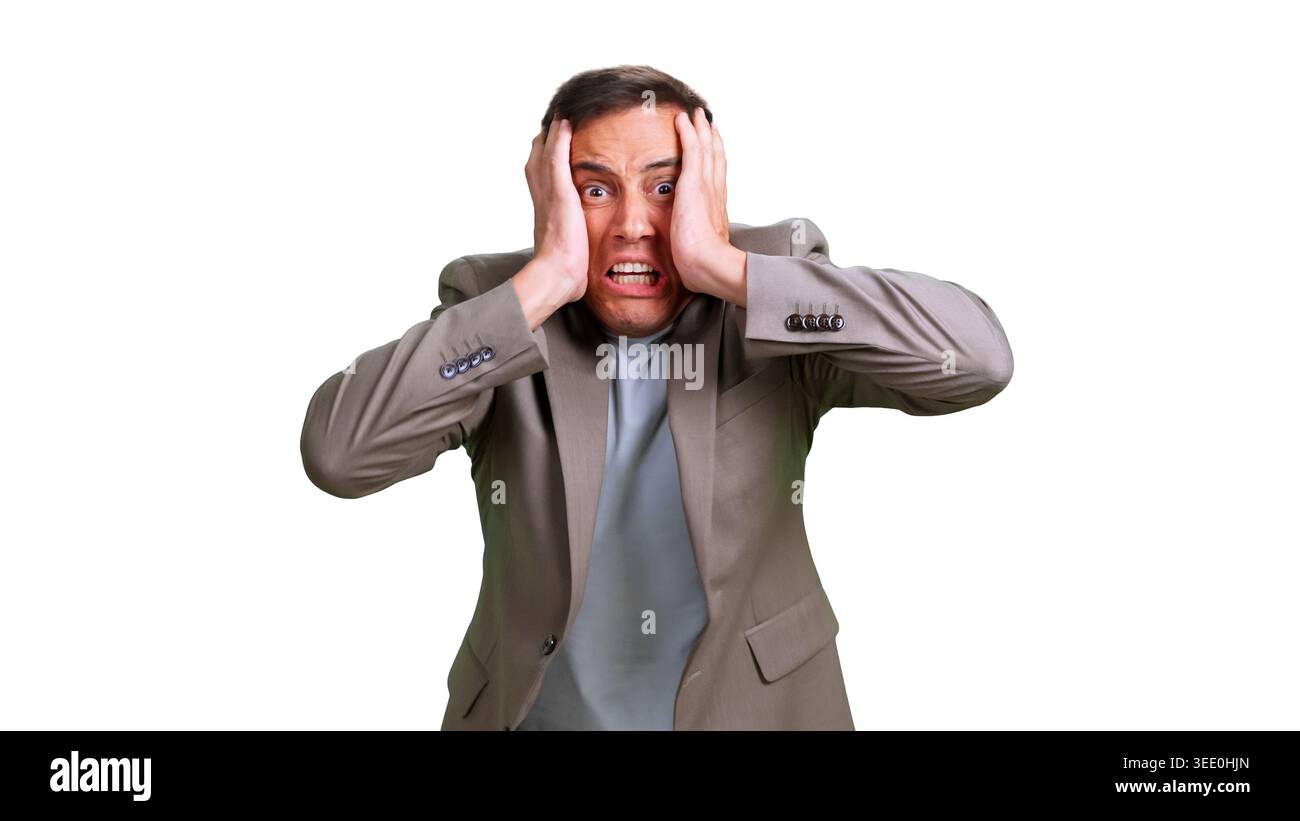 Stressed man panicking with hands on head Stock Photo