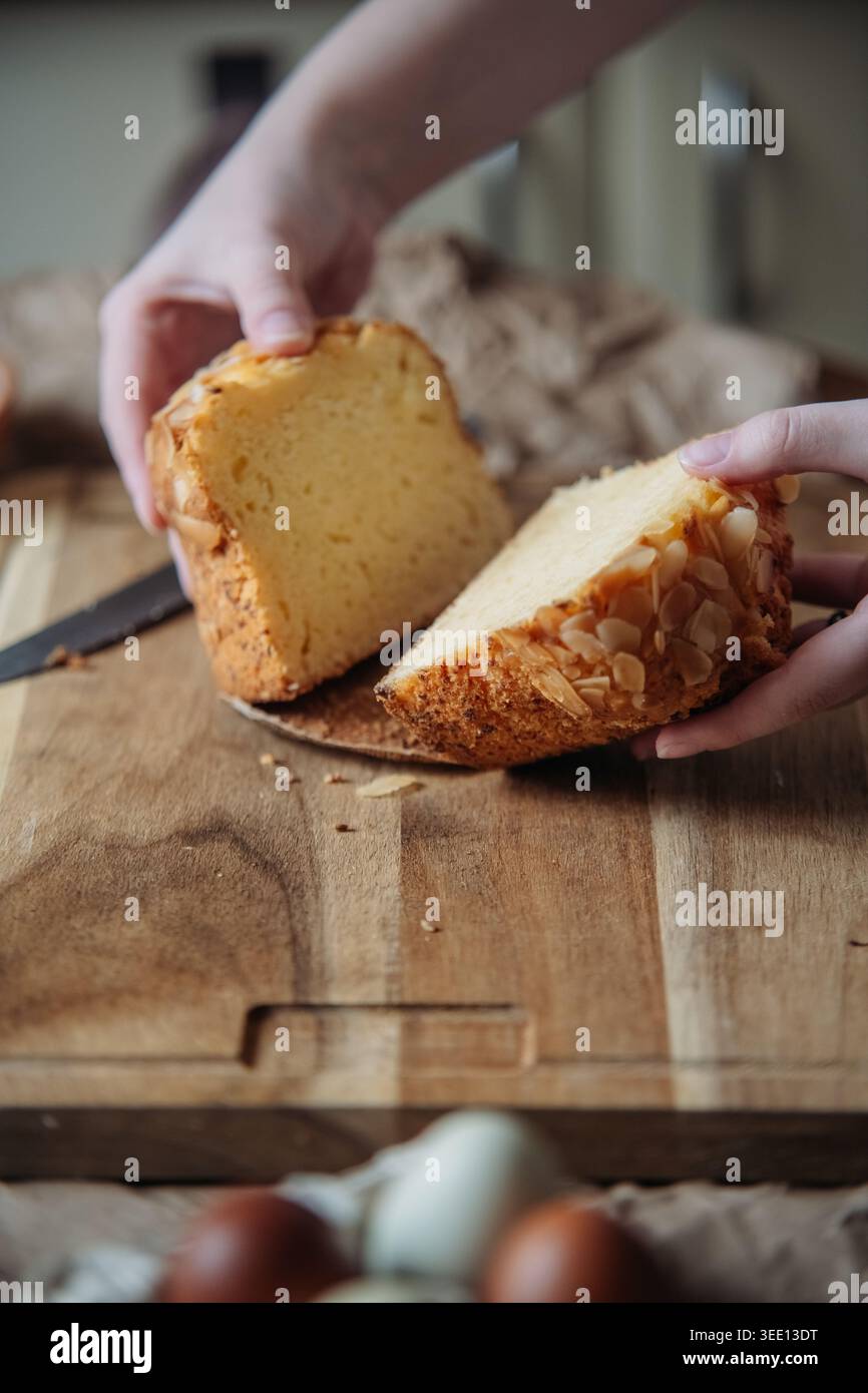 Fresh Easter Bread Slice In Hands Stock Photo
