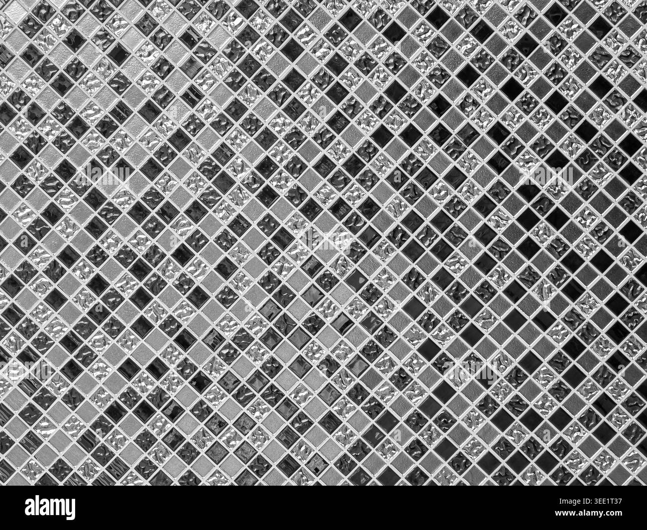 Black and white mosaic tile texture showing calming and structured ...