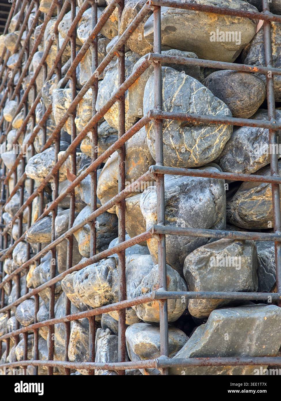 Gabion retaining wall structure made of natural stone rock boulders ...