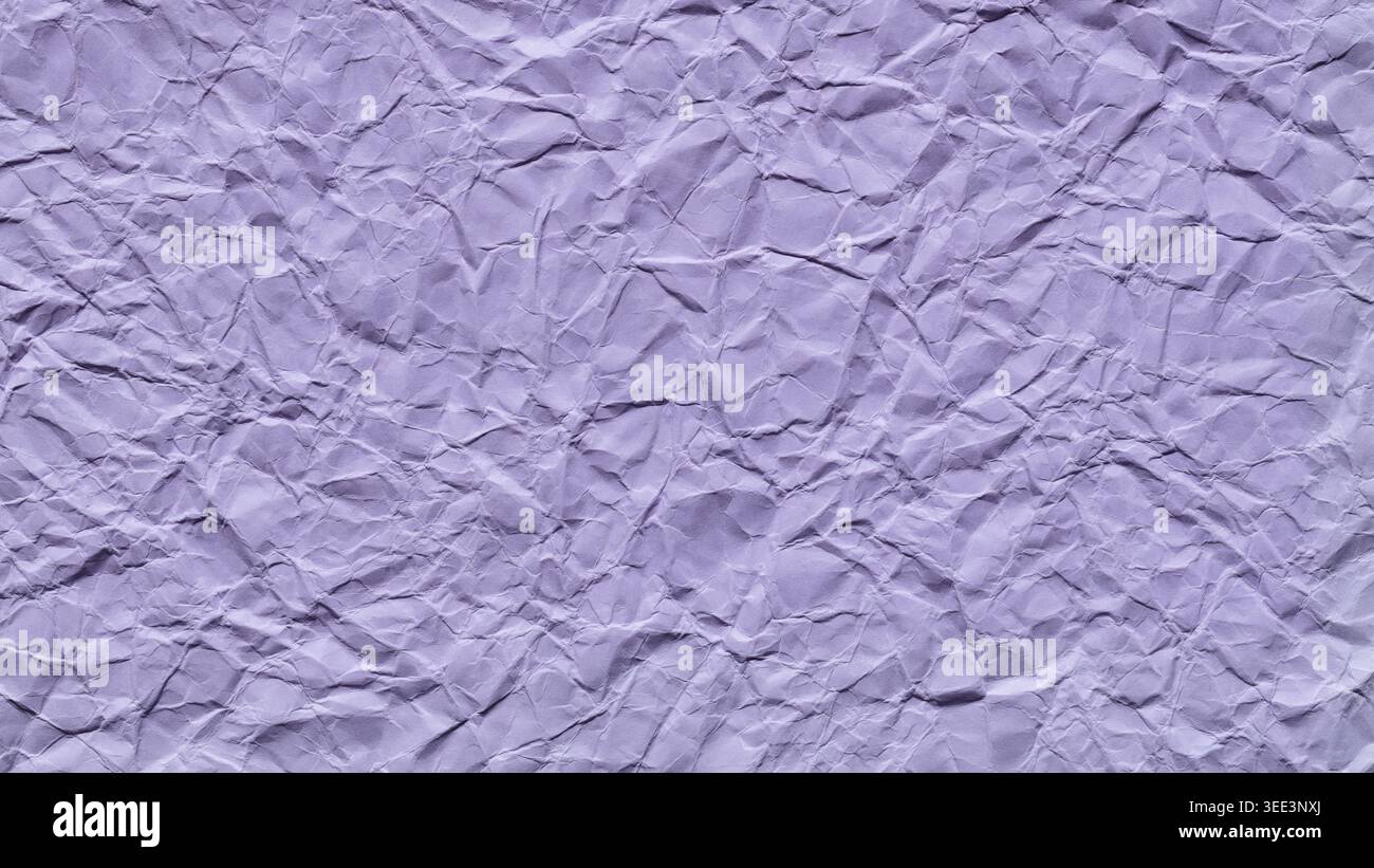 Crumpled purple paper texture with wrinkled surface creating abstract pattern background Stock Photo