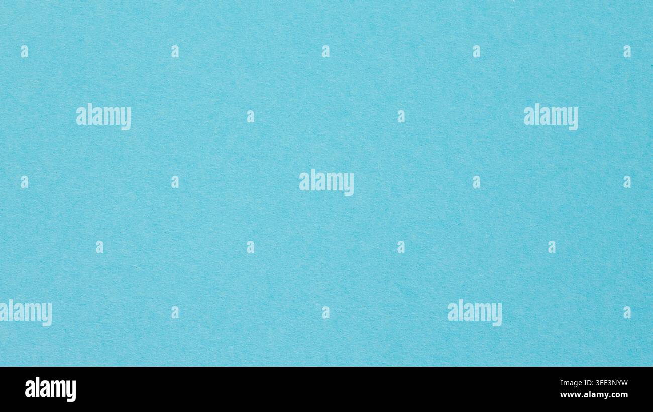 Bright cyan blue paper background with subtle texture for copy space Stock Photo