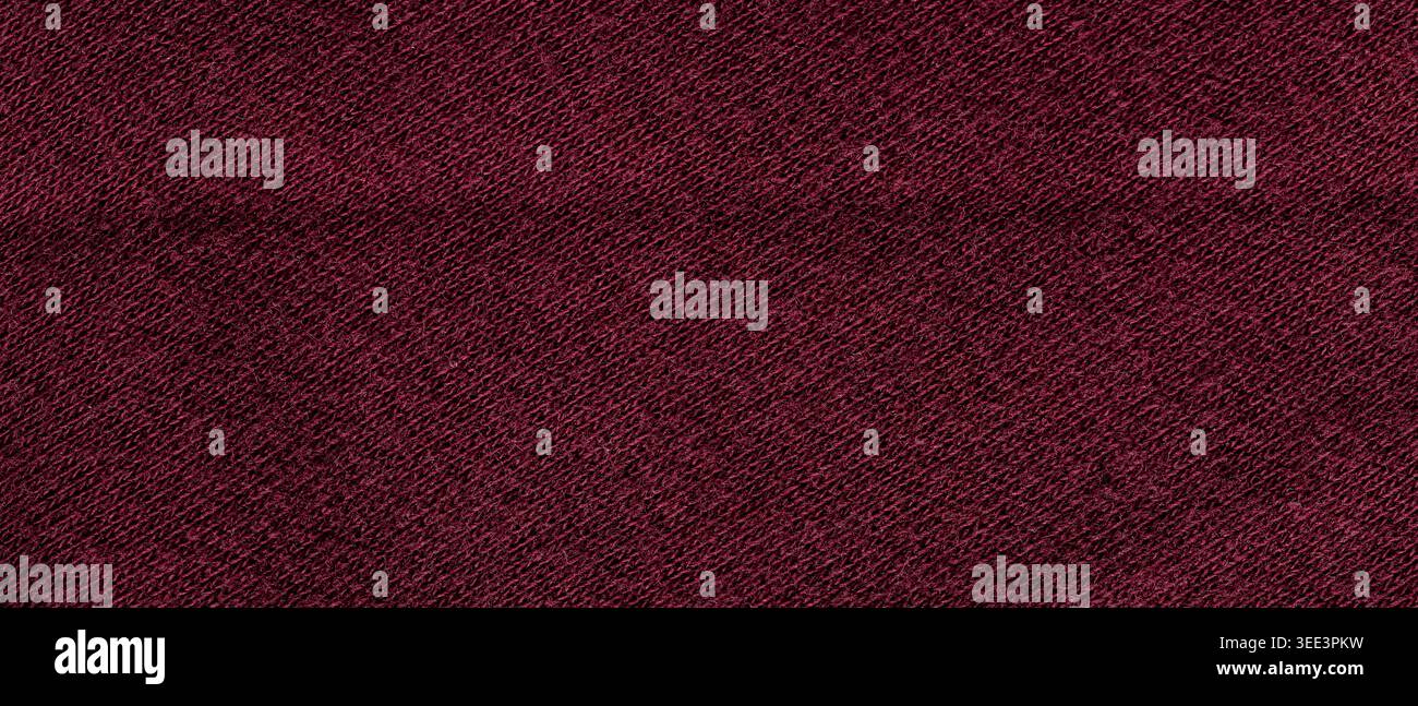 Dark burgundy wine knitted wool fabric texture with diagonal weave pattern Stock Photo