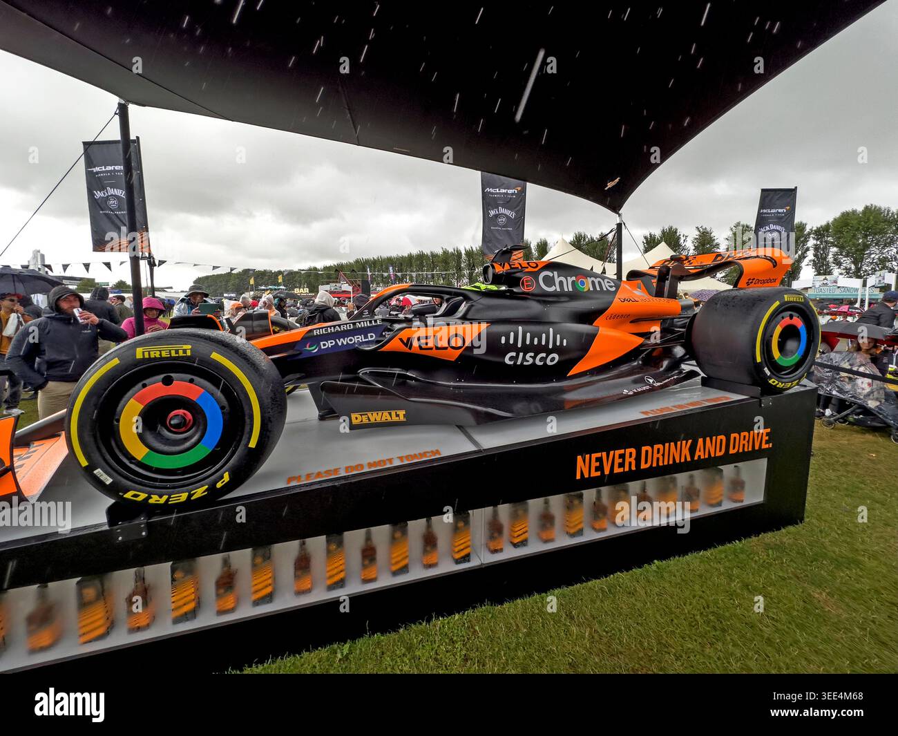 Papaya and black McLaren MCL38 race car on show during the British Grand Prix Silverstone Circuit, promoting the Never Drink and Drive message Stock Photo