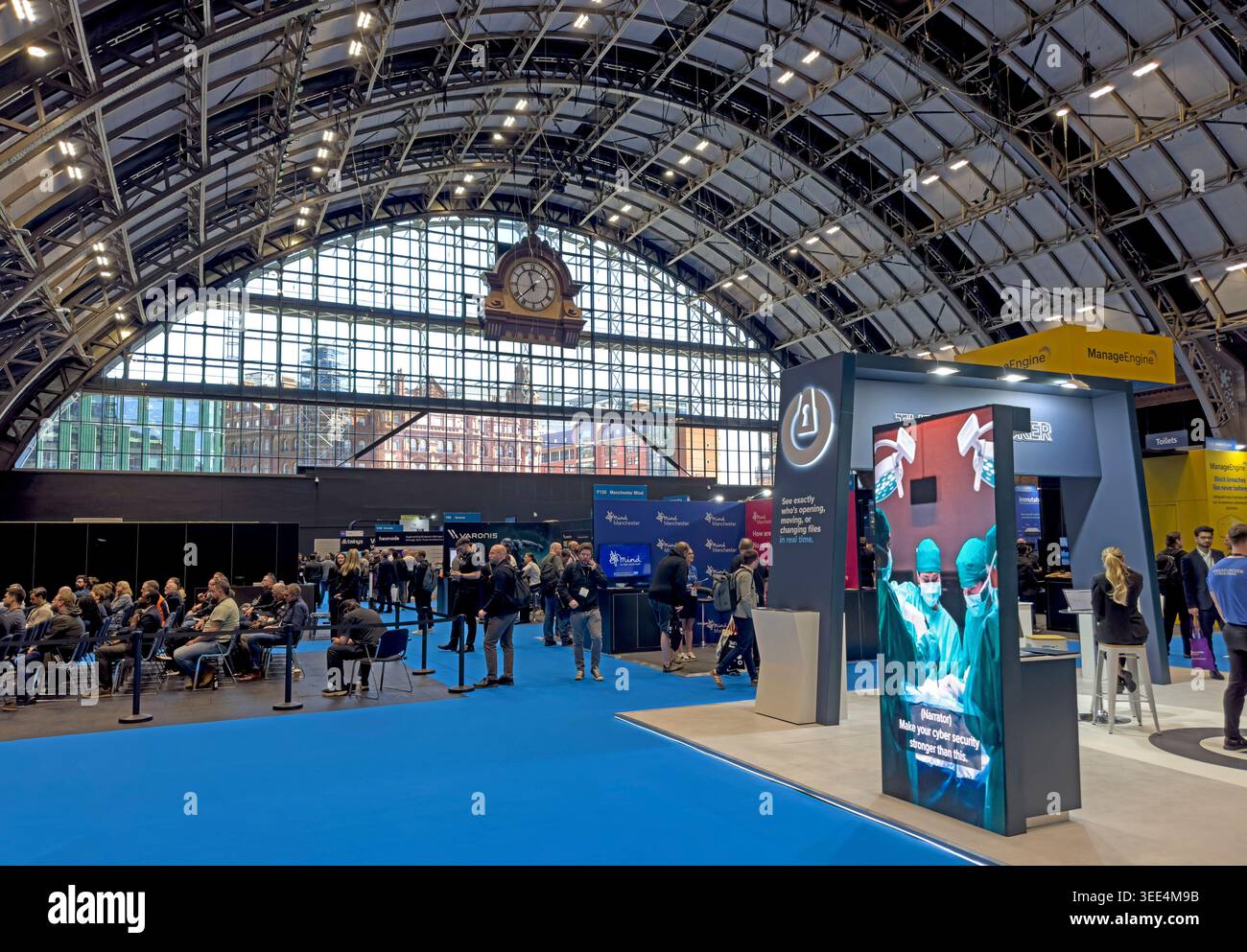 DTX Manchester exhibition at Manchester Central, showing delegates, trade stands and digital transformation displays. Stock Photo