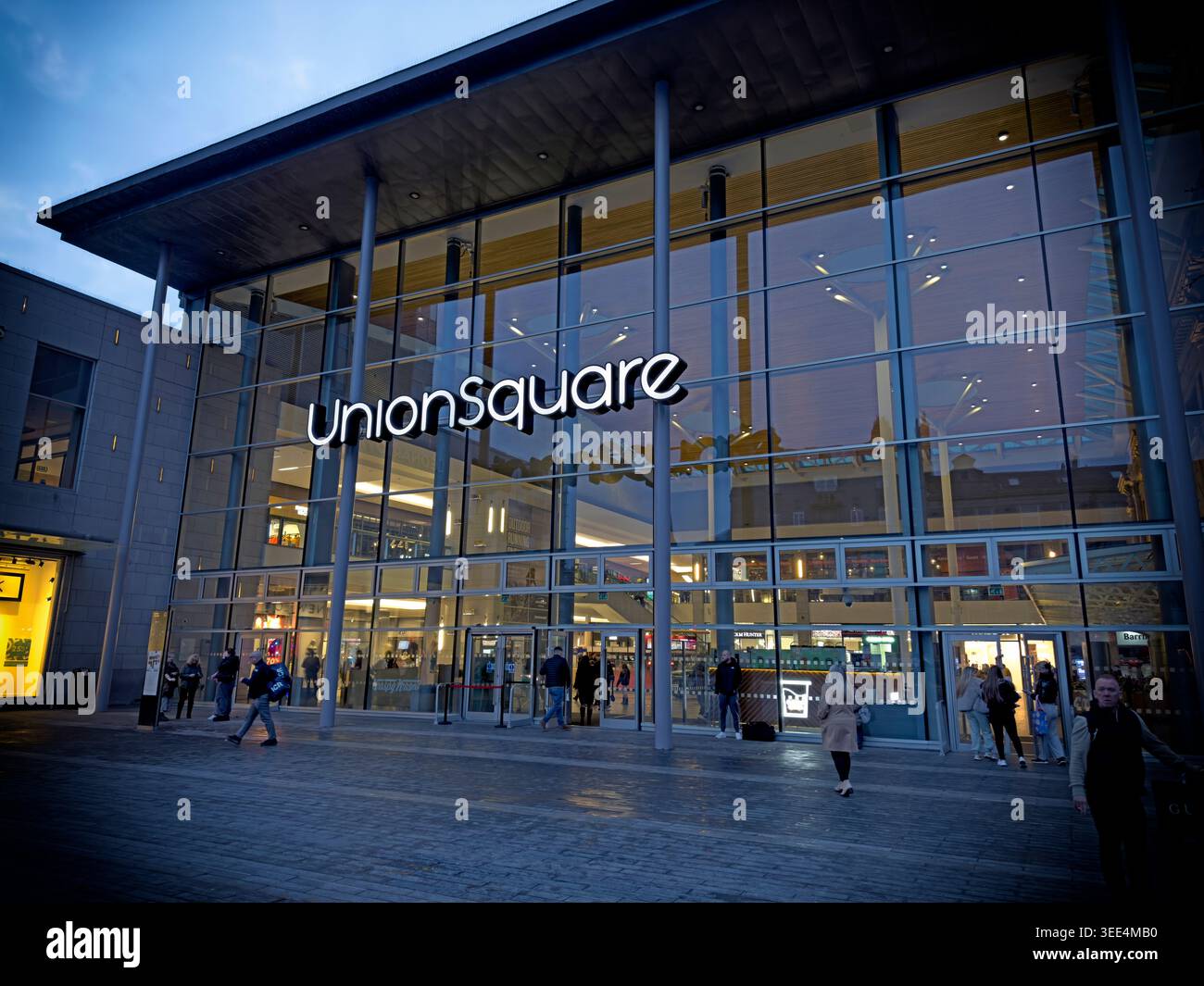 Union Square shopping centre and Aberdeen station entrance at dusk, a major retail and transport hub in the city. Stock Photo