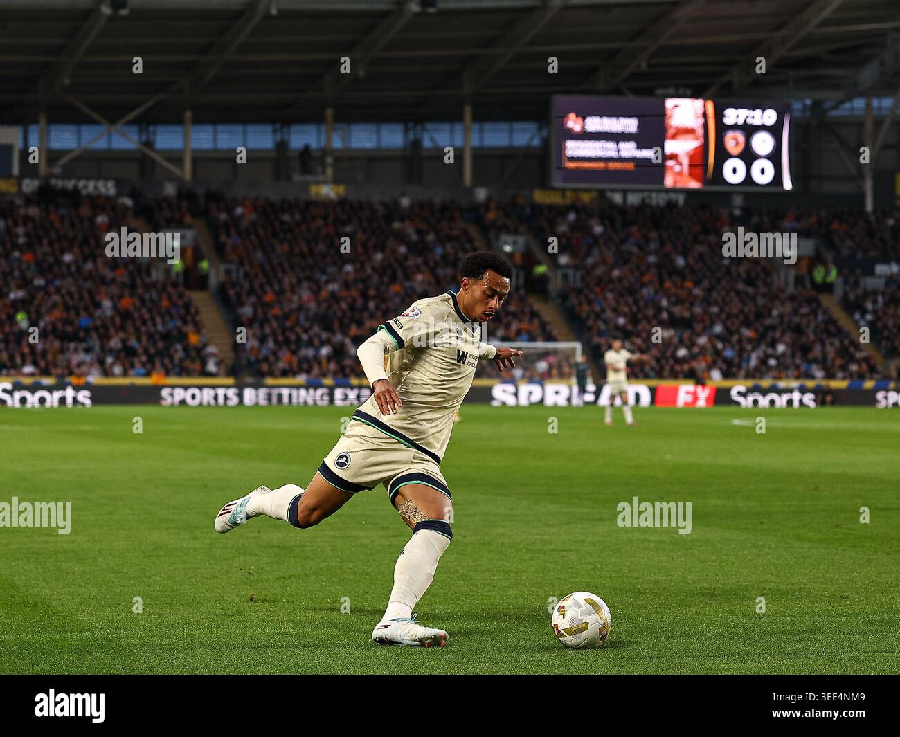 HULL, ENGLAND - MAY 8: Femi Azeez of Millwall FC crosses the ball ...