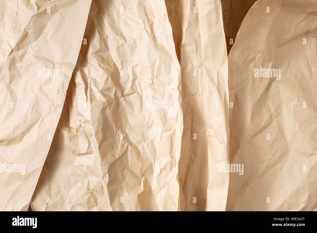 A view of a brown packing paper, as a background. Stock Photo