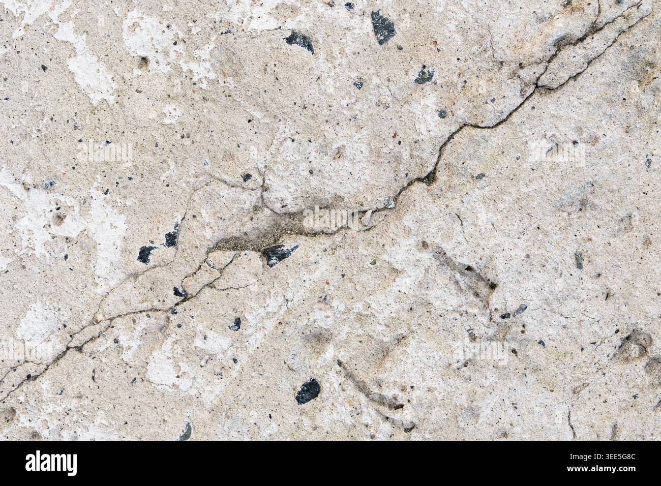 Rough industrial concrete surface with deep structural crack texture Stock Photo