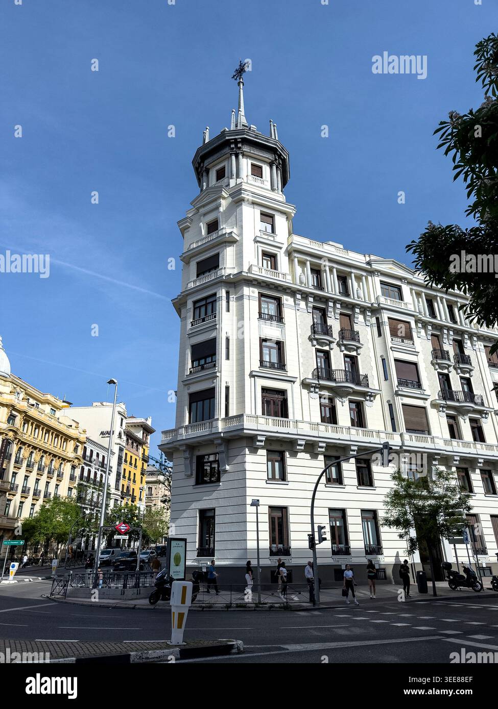 Calle Almagro and Glorieta de Alonso Martinez, Chamberi, Madrid, Vintage classic building with a spire , spain - Smartphone Captured Stock Image