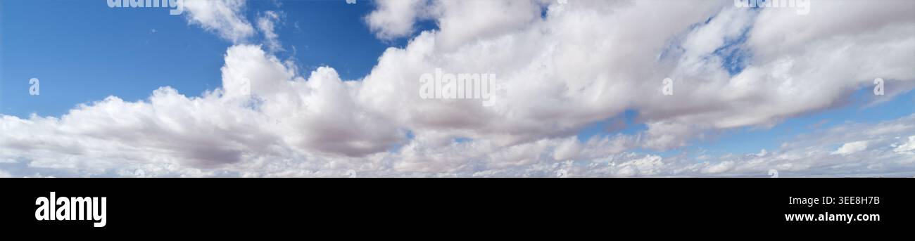 Mixed clouds and blue-sky panorama. Stock Photo