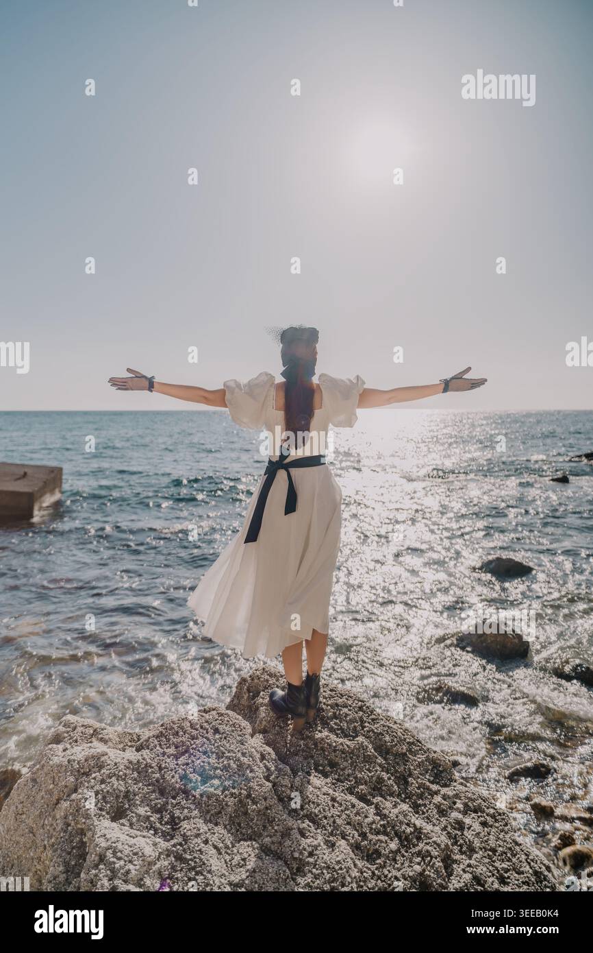 White flowing dress hi-res stock photography and images - Alamy White flowing dress hi-res stock photography and images - Alamy