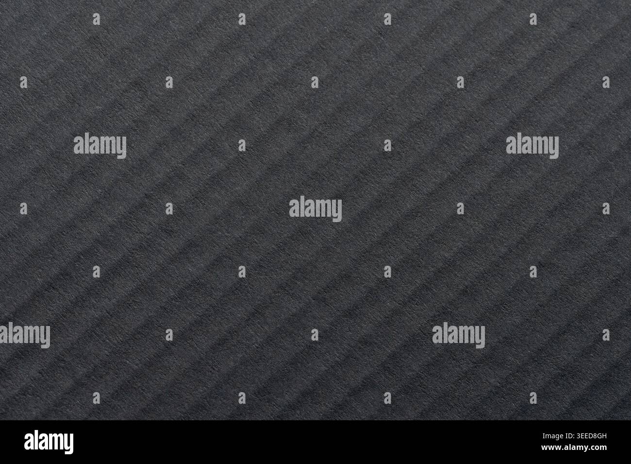Black matte paper pattern with lines material  macro close up view Stock Photo