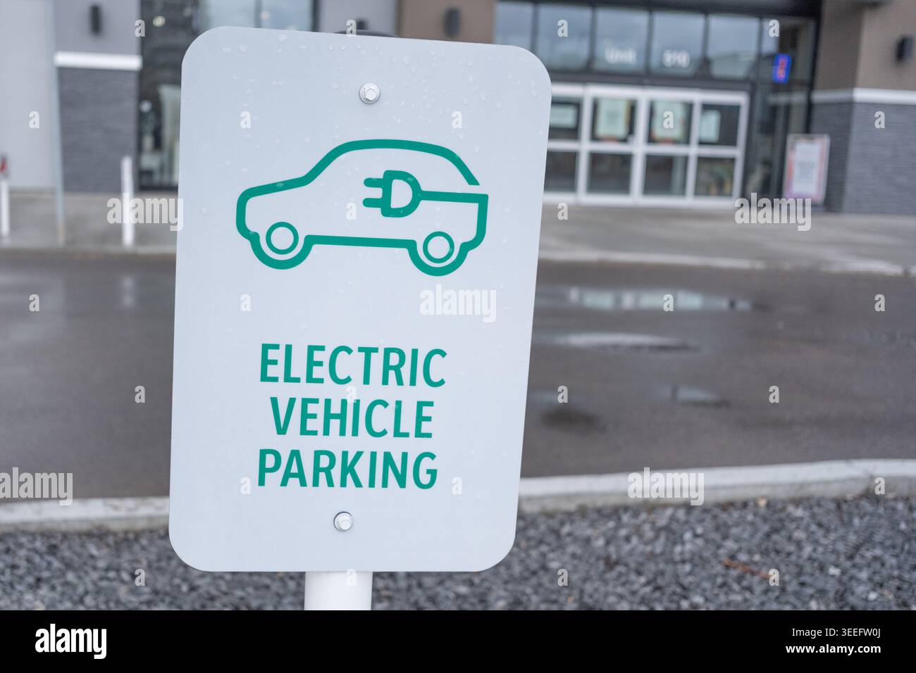 Ev Signs Electric Vehicle parking sign for charging EV's Stock Photo - Alamy