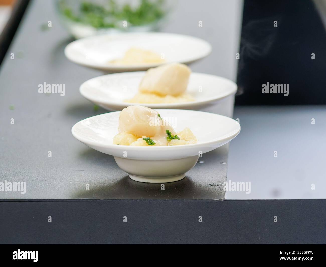 Assorted gourmet vegetable appetizers with tartines and zucchini rolls served as elegant finger food on a catering buffet table. Stock Photo