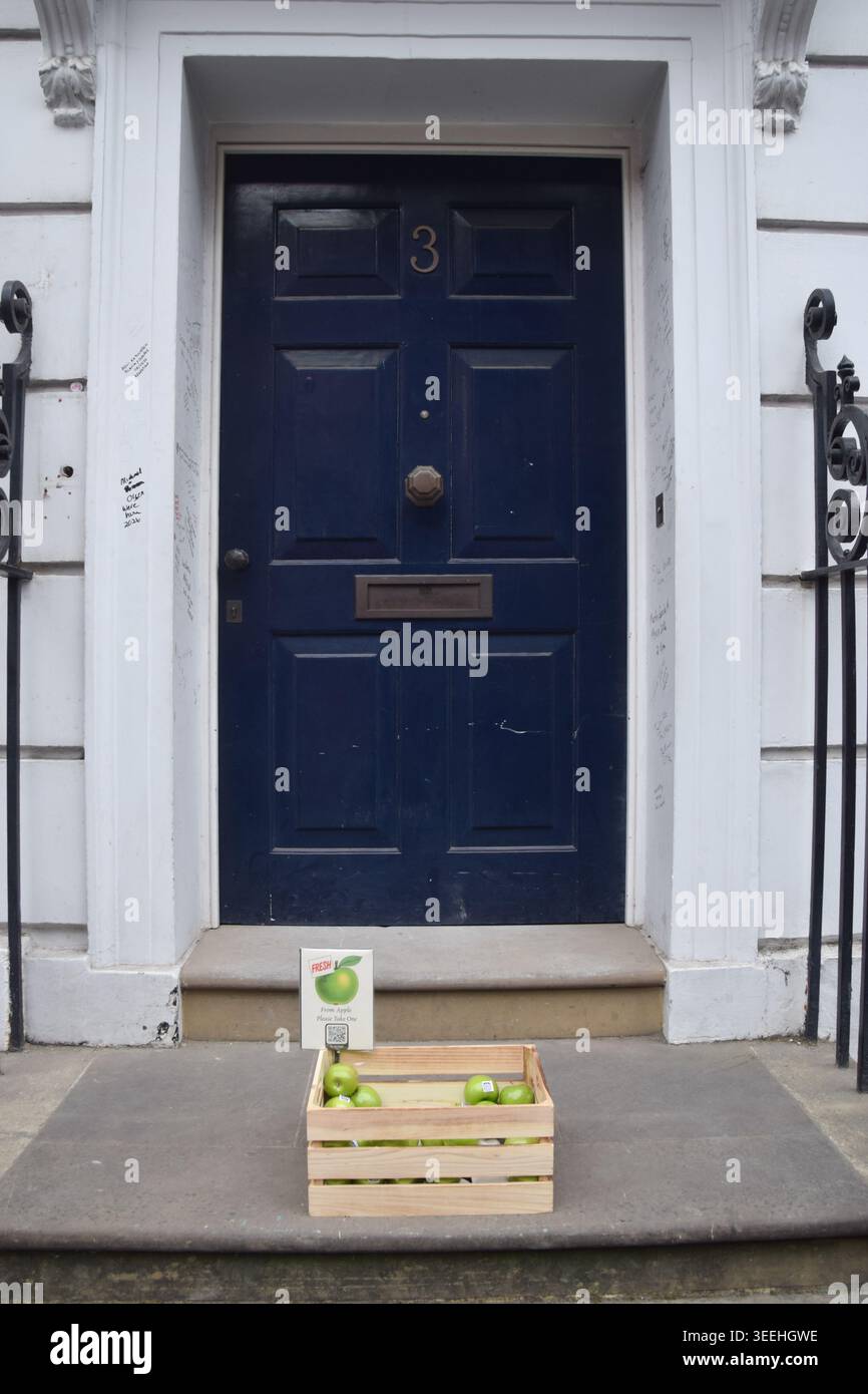 London, England, UK. 11th May, 2026. A box of green Granny Smith apples, referencing The Beatles' Apple Corps logo, along with a QR code which links to a website about the planned museum, has been placed outside 3 Saville Row, the site of the band's last ever gig, which will be open to visitors in 2027. The Grade II listed building was The Beatles' headquarters from 1968 to 1972 and their final album, Let It Be, was recorded in the basement. The band famously played the show on the rooftop. Credit: ZUMA Press, Inc./Ä¢¹½´«Ã½ Live News Stock Photo