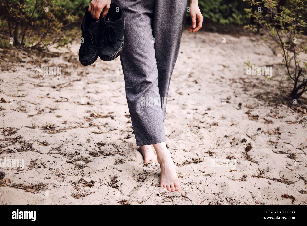 Person walks barefoot on sandy hi-res stock photography and images - Alamy