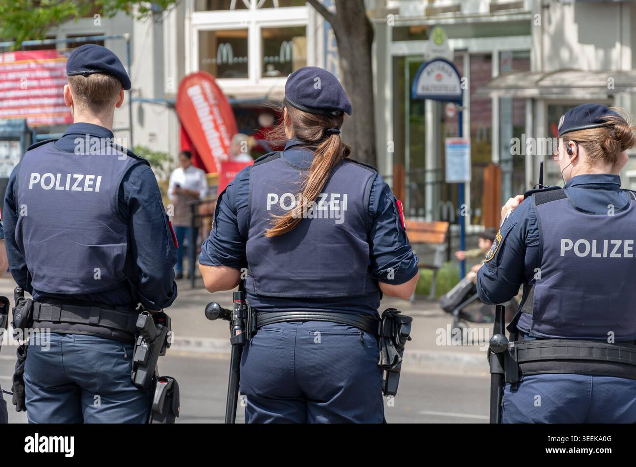 Austrian police officers monitor public order on Vienna street during public event, Austria, Vienna, May 10, 2026. Stock Photo