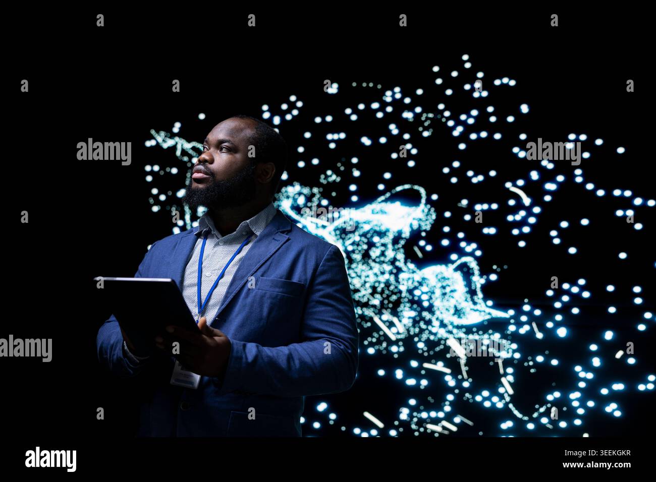 Implementing AI algorithms, tablet app and software developer creating deep learning system. Building neural network architecture, device and African american man using artificial intelligence Stock Photo