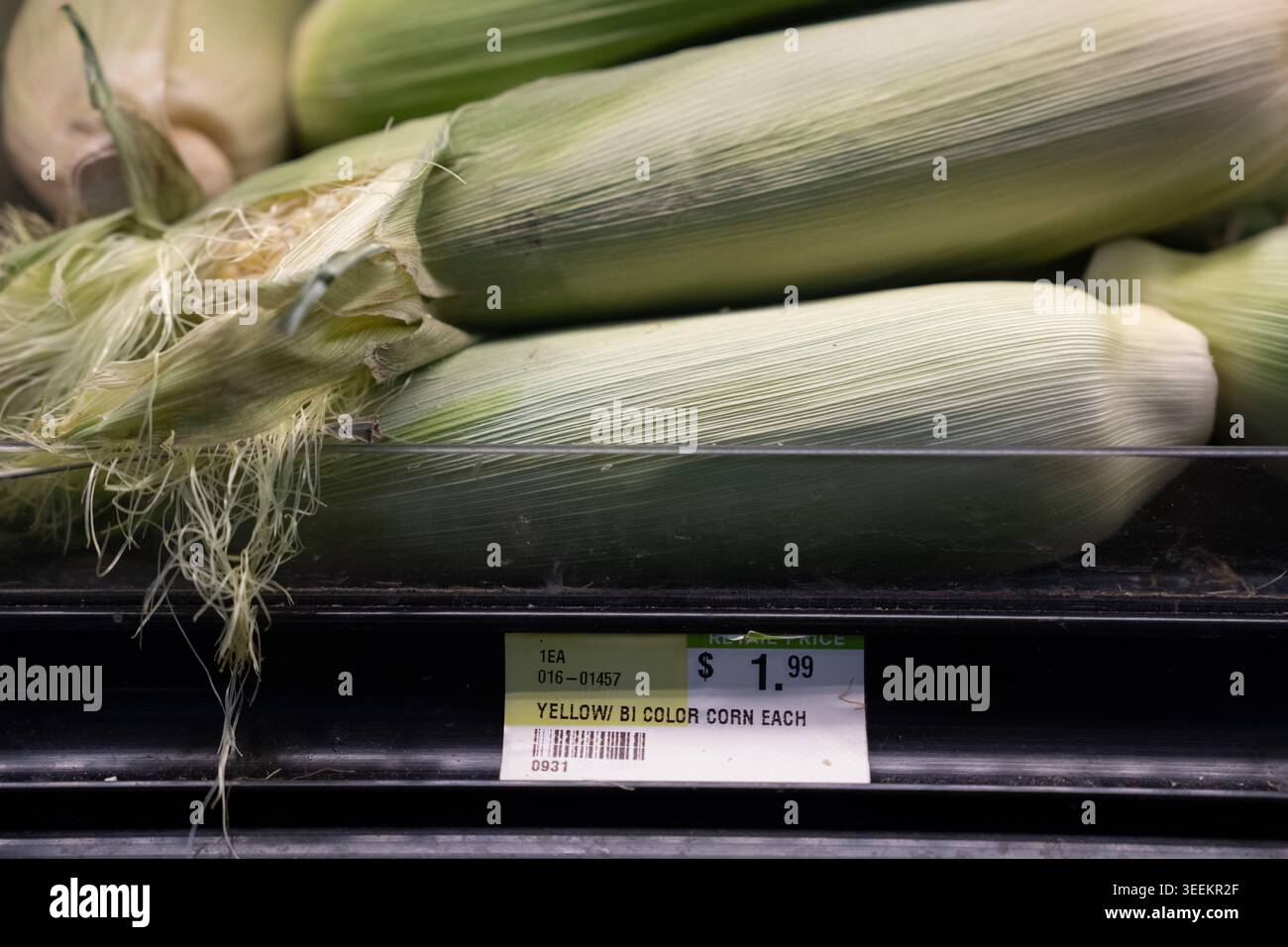The price of corn is seen in the produce section of a grocery store on ...
