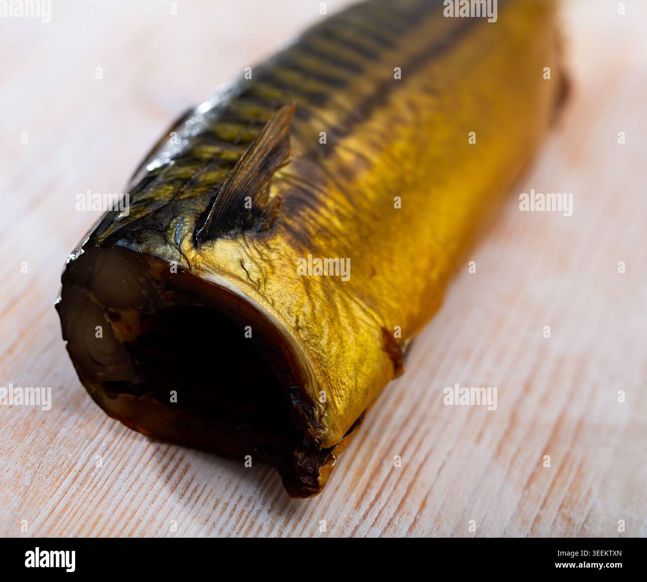 Smoked mackerel on wooden background Stock Photo