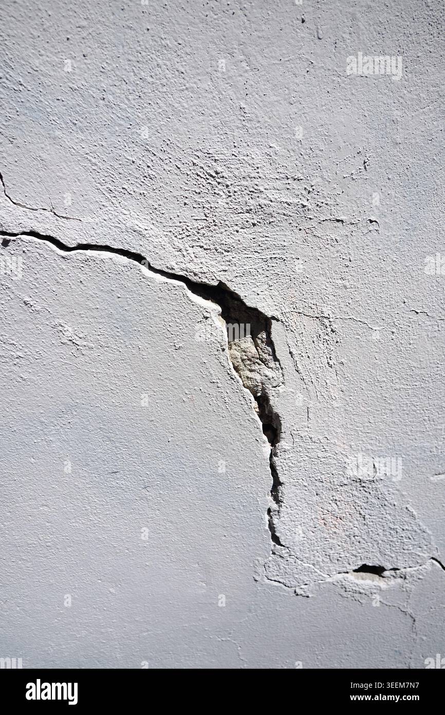 Cracked wall surface in a building Stock Photo
