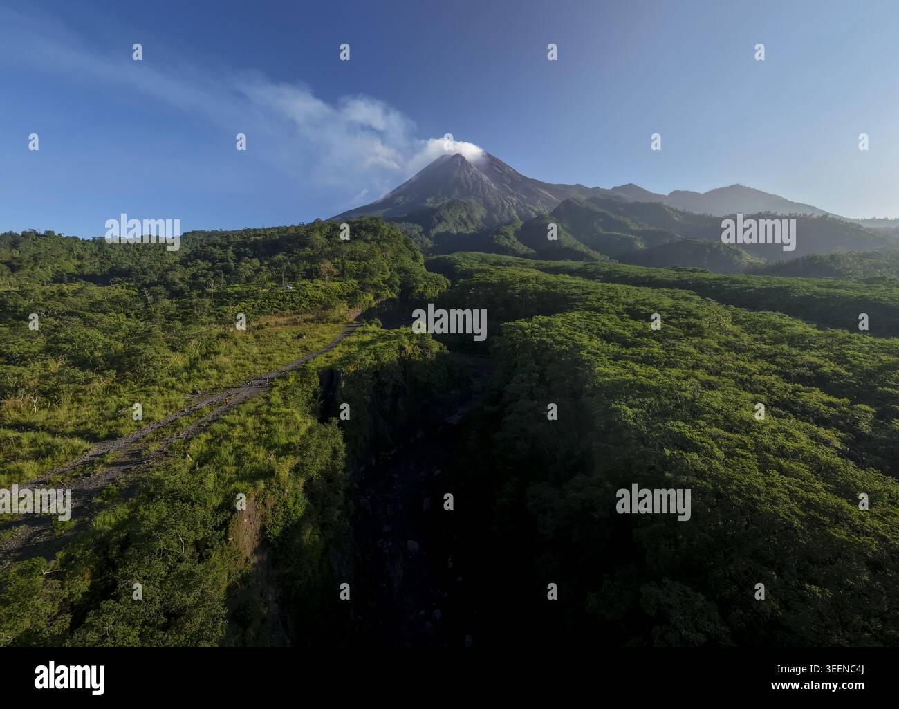 Aerial view of Bunker Kaliadem Merapi and the smoking peak of Mount ...