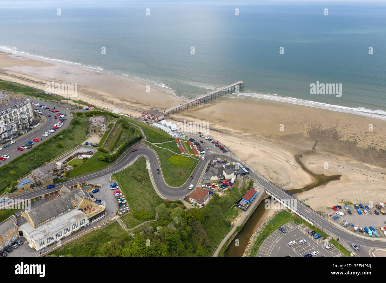 Saltburn Normal View Aerial view of Saltburn Pier winding coastal roads and sandy beach at ...