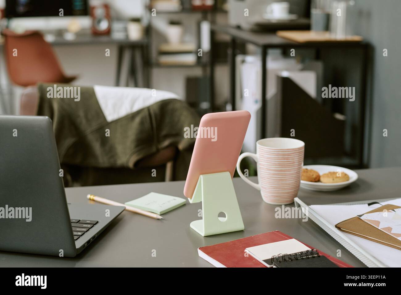 Home Office Workspace Featuring Laptop and Tablet for Remote Work Stock Photo