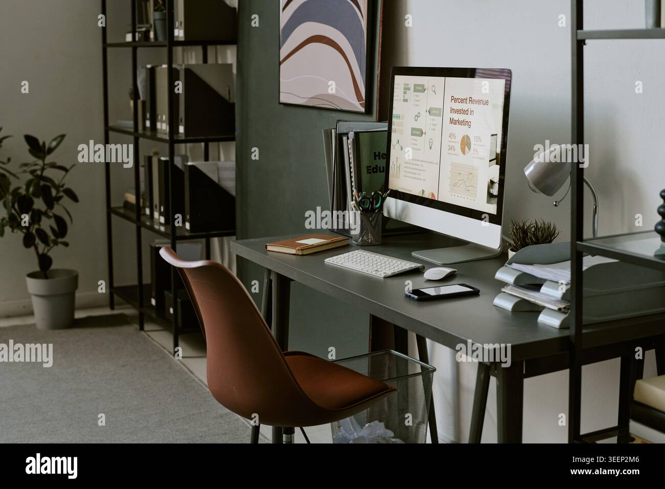 Modern Office Workspace Displaying Marketing Analytics Dashboard Stock Photo