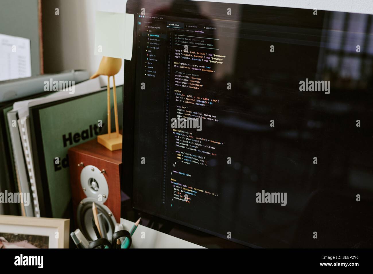 Software Developer Coding on Desktop Monitor for Technology Work Stock Photo