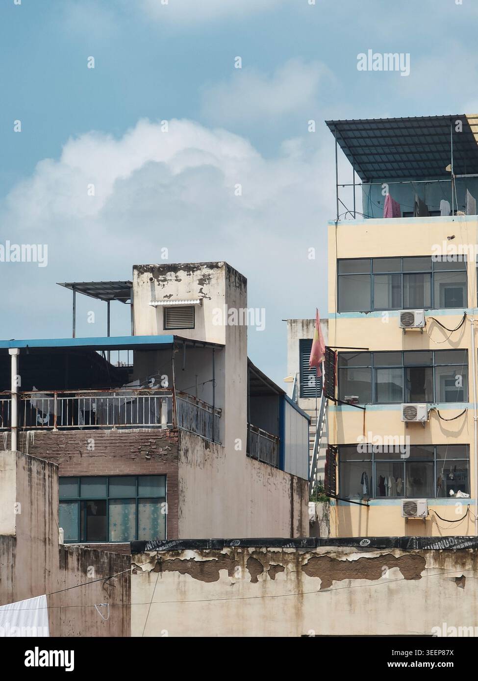 Weathered Apartment Rooftops in Urban China - Smartphone Captured Stock Image