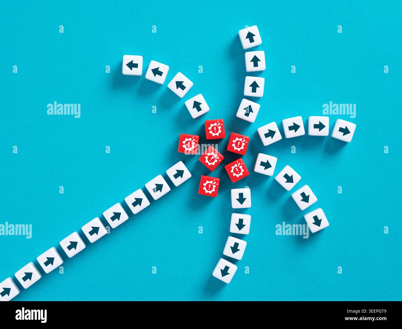 Business crisis and system failure concept with broken gear icons and arrows on blocks over blue background Stock Photo